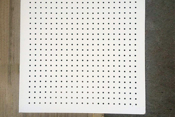Perforated calcium silicate board