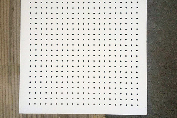 Perforated calcium silicate board